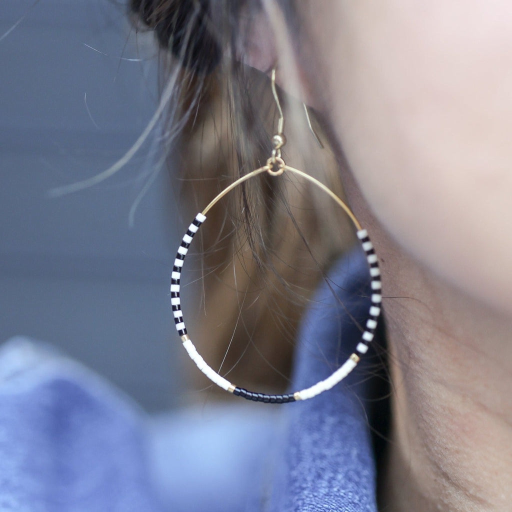 monochrome with gold accents beaded hoop earrings